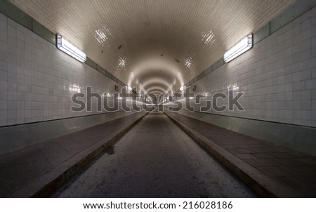 A view of the original 1911 Elbe Tunnel in Hamburg, Germany, which was built to transfer vehicles and pedestrians between central Hamburg and the docks on the south side of the river Elbe.