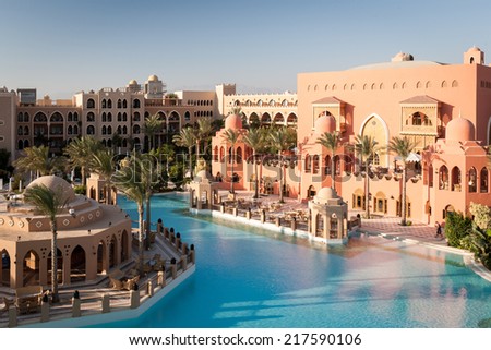 HURGHADA, EGYPT - NOVEMBER 22, 2006: A wide and high view of a 5 star luxury hotel resort near Hurghada, Egypt, showing the main pool and restaurant.