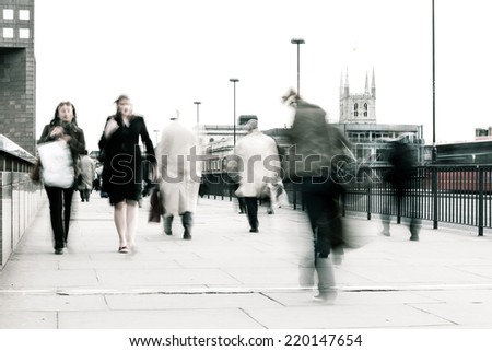 High key, abstract captures of business commuters during early morning London rush hour.  Long exposure creating a motion blur to emulate the movement of the scene.