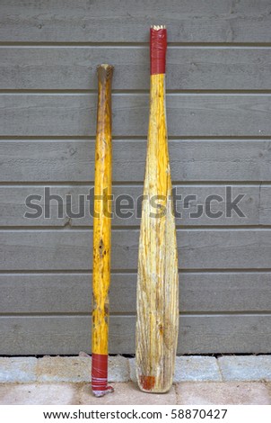 Old bats made of oar, for playing baseball, cricket or rounders