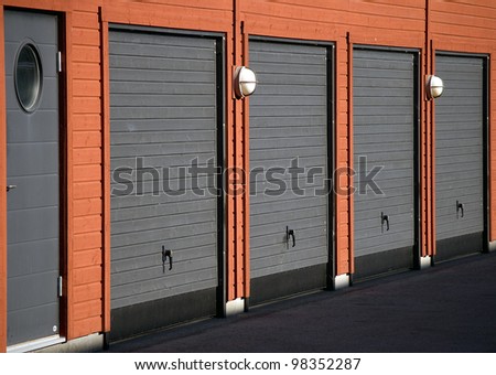 Modern wooden garage doors in gray and black
