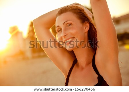 happy sunset dancing coast female