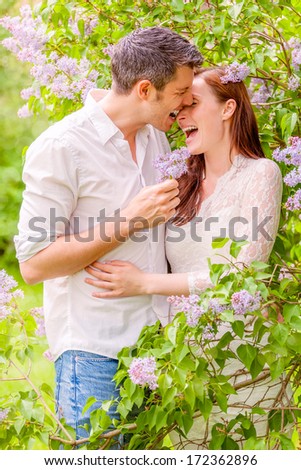 outdoor funny love couple in spring time