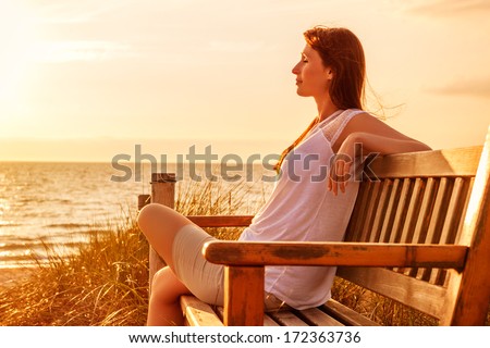 Relaxing Female On Sundown Coast