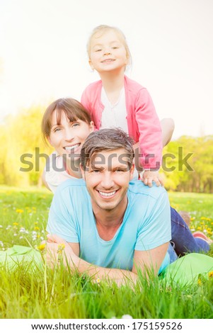 cute smiling funny three family members