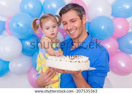 baloon and cake for birthday surprising