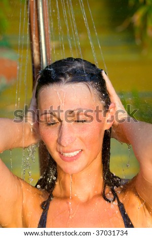 Outdoor showering spa wellness woman in garden