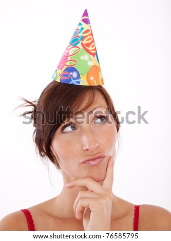 thinking woman with party hat for right gifts and who to invite for party - stock-photo-thinking-woman-with-party-hat-for-right-gifts-and-who-to-invite-for-party-76585795
