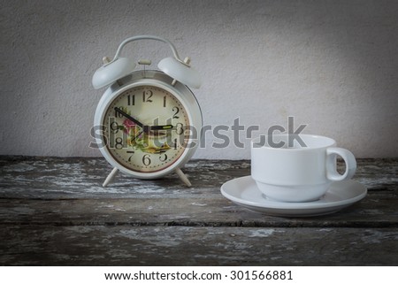 Still Life Coffee and clock on the wooden floor