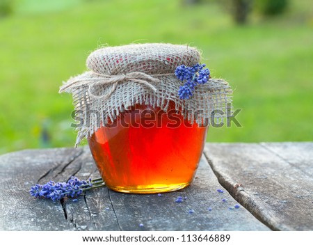 lavender honey on wooden garden table