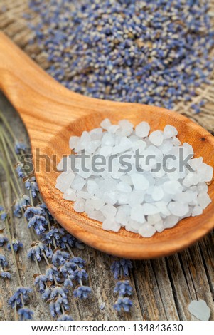 lavender bath salt on wooden surface