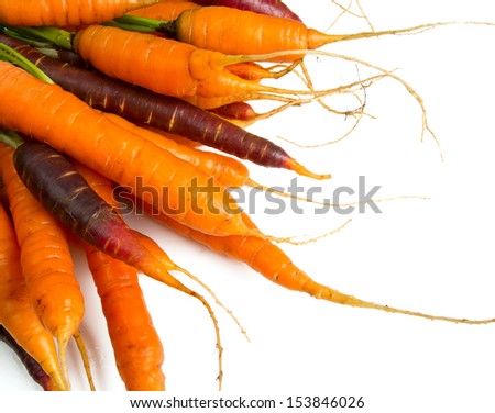 colored fresh carrots isolated on white