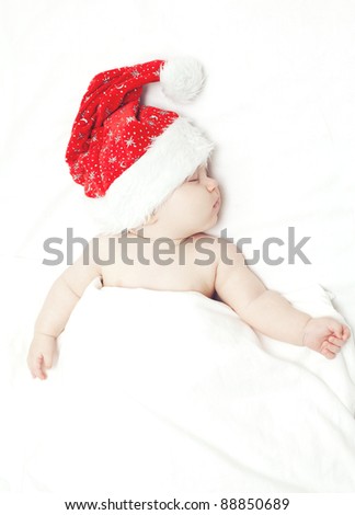 sleeping baby in santa\'s hat