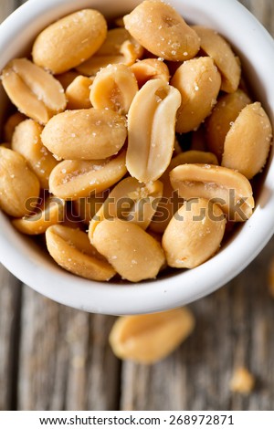 salted roasted peanuts in a bowl