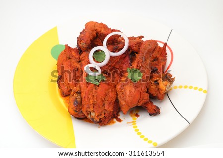 Indian style roasted chicken or tandoori chicken. Indian non vegetarian food.