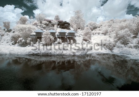 Local Houses by the riverside , Thailand taken in Near Infrared