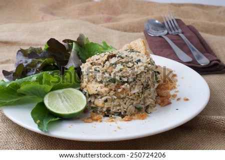 Isolated healthy fried rice with fork and spoon sack background/ Vintage food