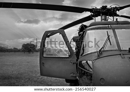 monochrome black and white Front view of military helicopter cockpit