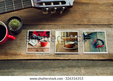 Memories of music travel stuff on wooden table,vintage tone in photo.