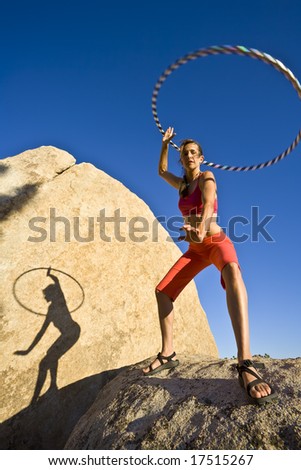 Hoop dancer performing in the California desert, on a summer afternoon.