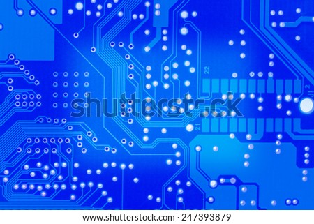 blue circuit board texture closeup ,tech industrial electronic background