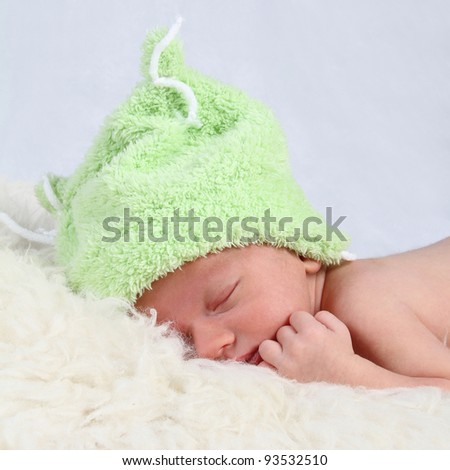 sleeping baby with cap