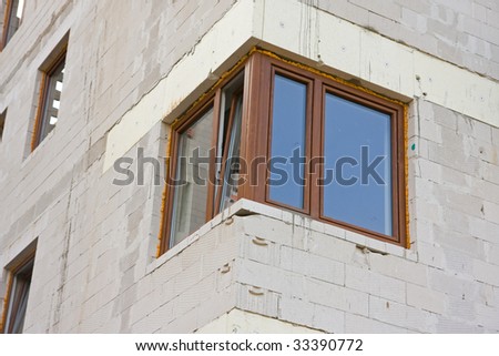 window in unfinished apartment building