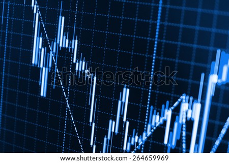 Stock chart graph of market share prices of company. Live on monitor desktop screen monitor. Business background. Blue color.