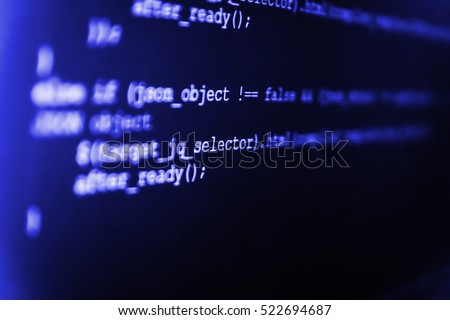 Programming code on computer screen. Server logs analysis. Programmer developer screen. Website codes on computer monitor. Source code close-up. Notebook closeup photo.