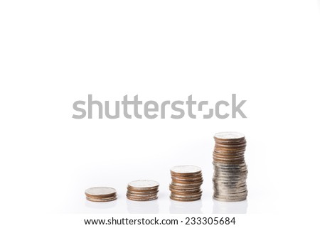 Pile of coins in graph shape on white background (leave space for text above)