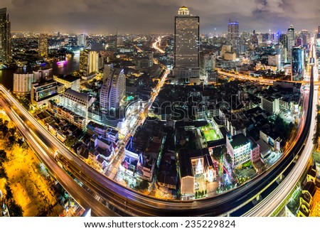 Bangkok, Thailand - December 2, 2014: Bangkok city night scenary with busy traffic and cloudy sky