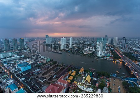 Bangkok, Thailand - December 2, 2014: Bird eye view of Bangkok city along the river during sunset