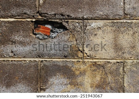 surface of crack block wall which repair with small brick