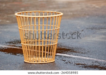 the basket for playing chair ball game is on the wet stadium in dry paint