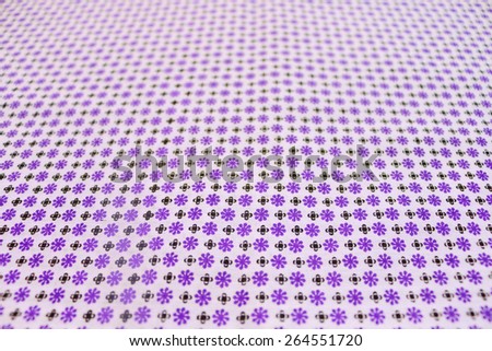 blur purple flower pattern fabric by soft focusing