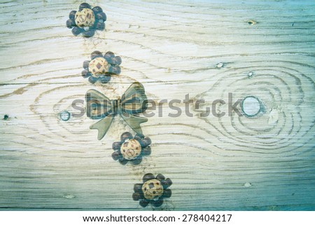 accessory from wool and wood on wood  plate texture background