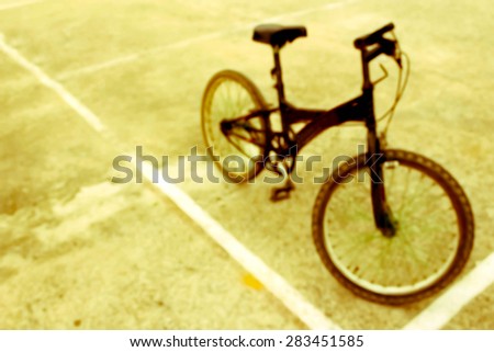 blur bicycle on sport stadium in day light