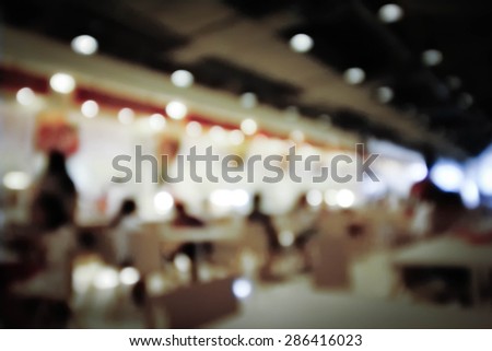 blur indoor restaurant with light in cool tone