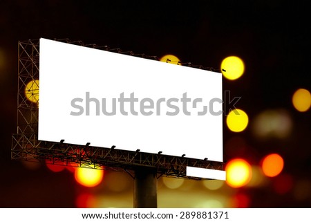 billboard on background from bokeh of traffic light and car