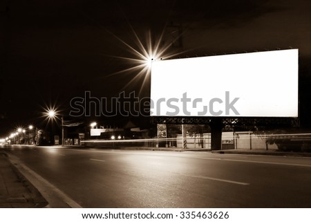 outdoor billboard and light on road in night time ,vintage tone