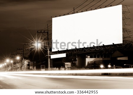 billboard and light on road in night time ,vintage tone
