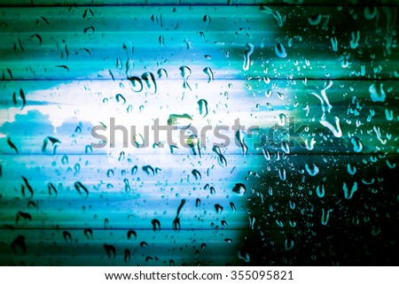 blur drop on mirror screen on steel rolling shutter