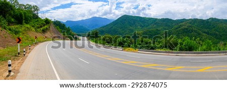 Road to Khao Kho District, Petchbun, Thailand. Road alongside mountain. Panorama mode. Beautiful sceneric.