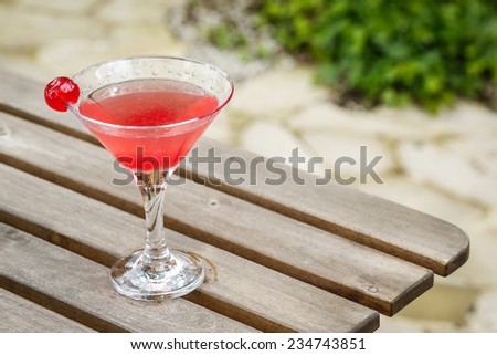 cocktail drink margarita in a garden on a garden table
