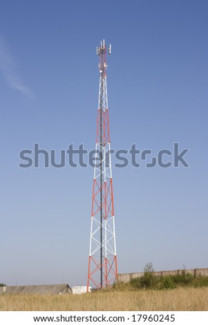 Tower of cellular communication on a background of the blue sky