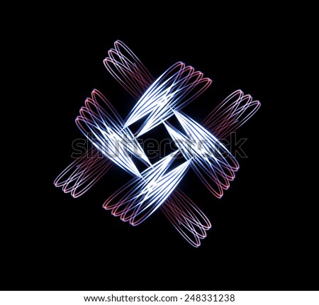 Physiogram, light painted pattern using a long exposure and torch.  Symmetrical abstract shape on a black background.