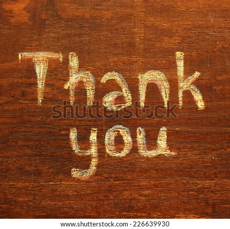 thank you note on wood background
