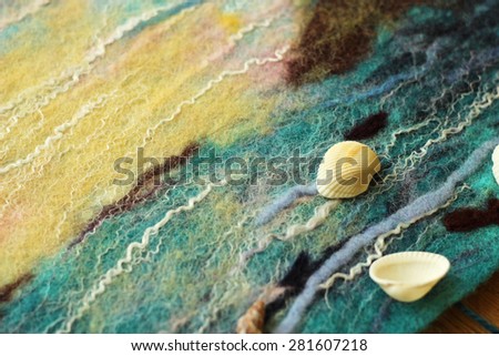 felted wool texture and sea shells