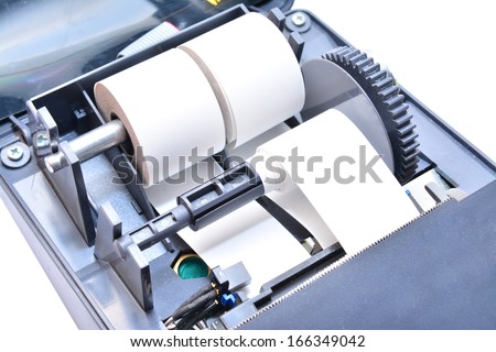 paper rolls inside a cash register