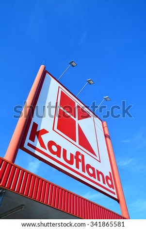 Caransebes, Romania - November 19, 2015: the kaufland supermarket company logo over blue sky background